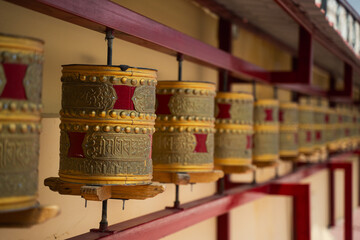 Closeup of Prayer Wheels in Ladakh, India. It is believed that each turn of a prayer wheel...