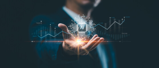 Businessman holding an artificial intelligence chip, utilizing smart robot AI technology for futuristic technological transformation.