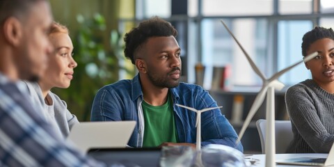 A team with diverse expertise collaborates on sustainable energy solutions, consulting on renewable energy ideas. Meetings promote green technologies in a modern, ecofriendly workplace