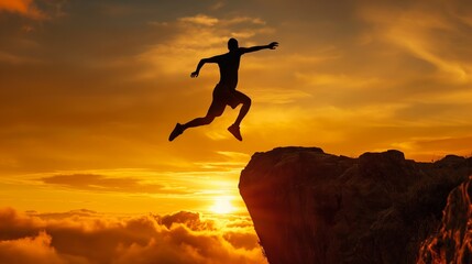 Silhouette of a person leaping between cliffs at sunset, symbolizing taking risks and achieving goals.