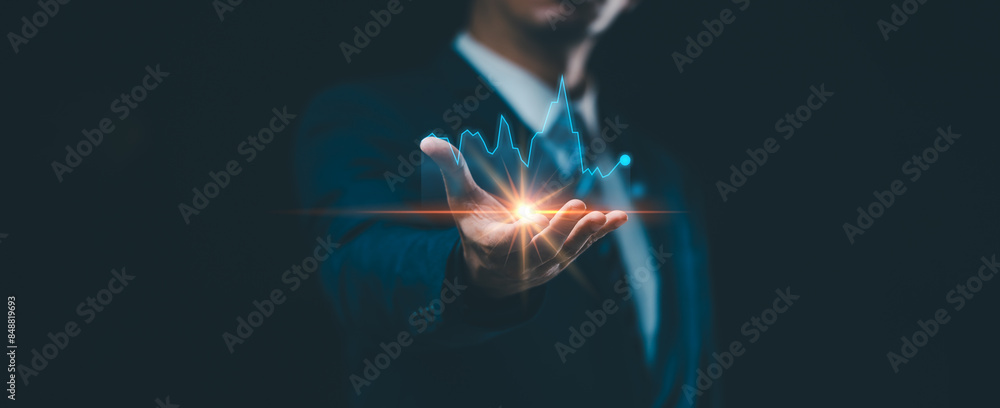 Poster businessman holding a graph of business growth, incorporating blockchain technology and data analysi