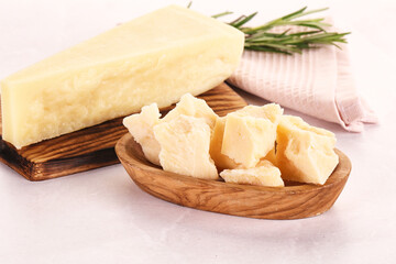 Chopped Italian hard parmesan cheese