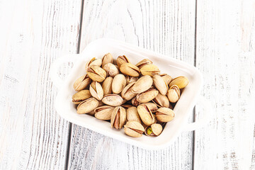 Salted tasty pistachio nuts heap