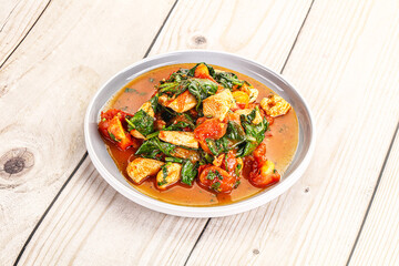 Chicken with tomato and spinach