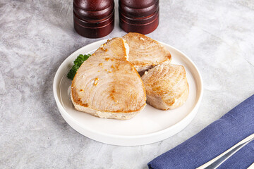 Roasted red tuna steak in the plate
