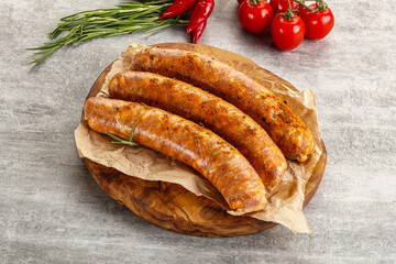 Raw sausages with spices and herbs