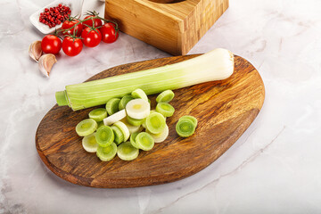 Ripe sliced leek over board