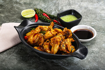 Vietnamese cuisine - fried frog with vegetables