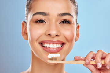 Woman, studio and portrait with bamboo toothbrush, dental care and mouth wellness for hygiene....