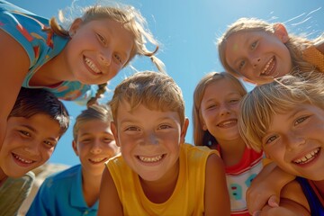 Fototapeta premium A group of children are smiling and posing for a picture