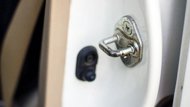 Car door striker plate hook, car lock system.