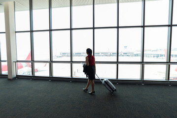 Business woman waiting for delayed flight.woman at the airport. flight delay