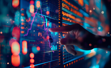 Hand interacting with a futuristic digital screen displaying stock market data and graphs.