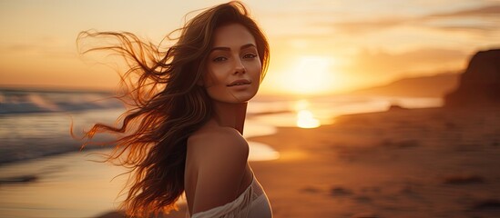 Fototapeta premium A stunning young woman poses stylishly at the beach during sunset with a captivating copy space image