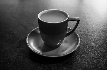cup with  coffee  on the table