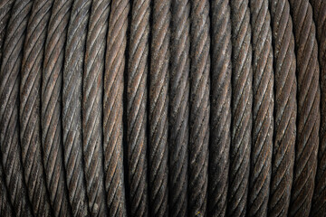 old and vintage iron cable on spool .
