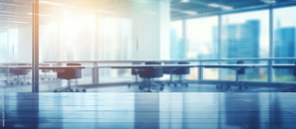 Poster empty open office space with blurred light bokeh ideal as a design background with copy space image