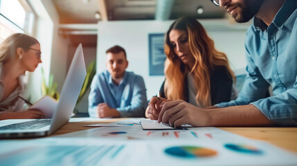 Collaborative Financial Forecasting: Business Team Engages in Focused Discussion