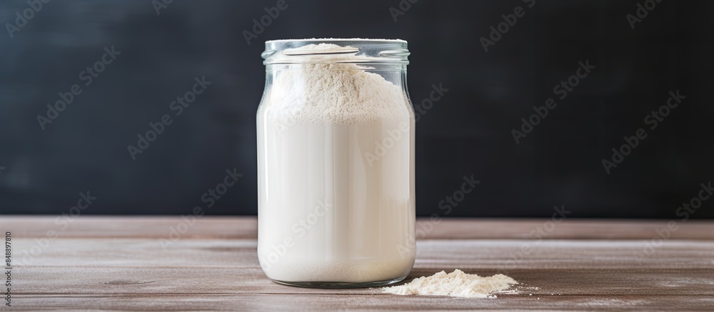 Poster close up image of a container of milk whey protein with copy space image
