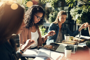 Teamwork, restaurant and women holding hands for prayer to bless food and lunch. People, university student and study group with thanks, appreciation and grateful for guidance with laptop or textbook