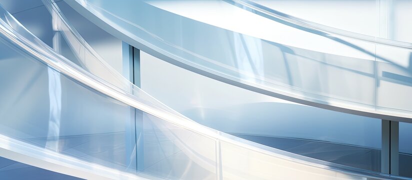 Abstract modern architecture fragment with curvilinear structure captured in a close up photo highlighting white stairs reflecting in a glass balustrade with lights and shadows perfect for a copy spac