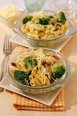 Macaroni with broccoli and ham.