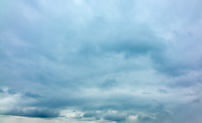 Rain clouds over a mountain range in the distance. Change of weather in the rainy season....