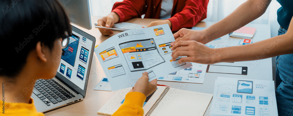 Poster panorama banner of startup company employee planning on user interface prototype for mobile applicat