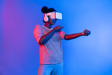 Hunting African gamer wearing VR turning metaverse world playing gun shooting hunter isolate blue neon light connect victory animal hunting futuristic technology hologram virtual reality. Contrivance.