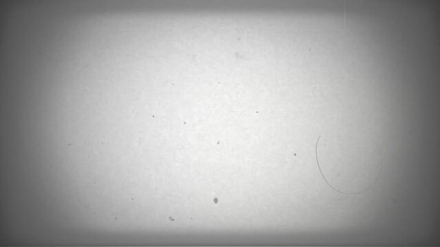 Vintage white film background with vignette. Copy space on centre. Old retro wipe rolling effect. Scratches, details and noise. Dusty and grainy feel. 4K motion graphics.