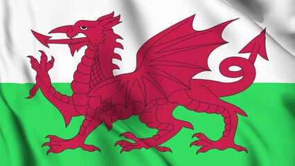 Waving Flag of Wales video background. Realistic Slow Motion Animation. Wales flag 4K Loop Motion Graphics. Celebrating St. David's Day and Welsh pride.