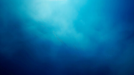 A blue sky with a few clouds