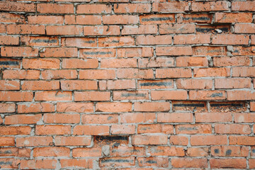 Fototapeta premium old brick wall, red and white colour, broken bricks, peeling plaster, vintage texture, background for banner, copy space