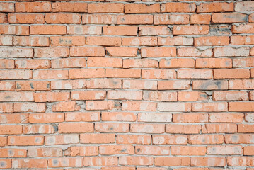 Obraz premium old brick wall, red and white colour, broken bricks, peeling plaster, vintage texture, background for banner, copy space