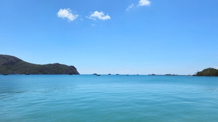 Beautiful blue ocean and mountain at Ben Dam port, Con Son island, Vietnam in the morning.