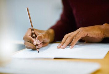 Writing, notebook and hands of person in library for university education, scholarship course or...
