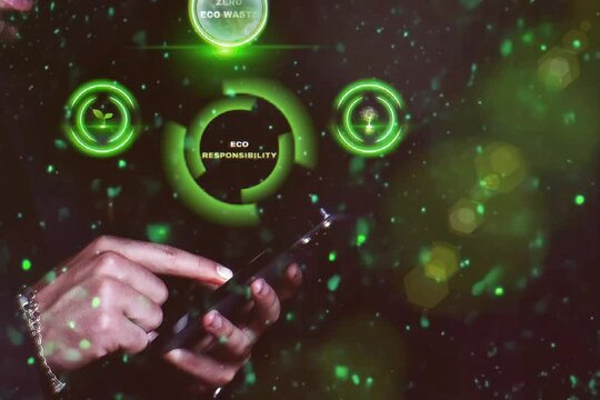 Video of a man is using a cell phone with a green screen that says "Responsibility" on it