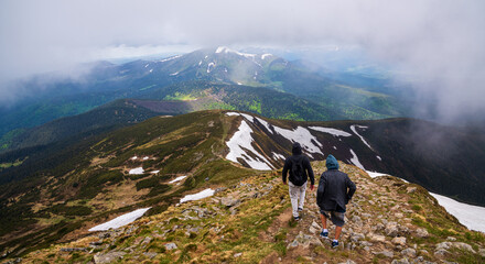 Wonderful nature. Rocky land, high mountains, dramatic sky.