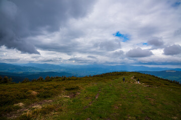 Wonderful nature. Rocky land, high mountains, dramatic sky.