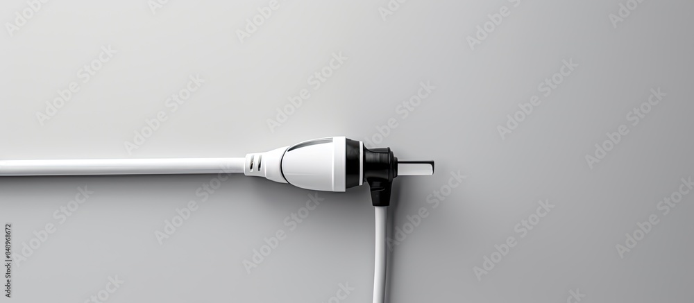 Poster a cable attached to a vehicle for charging with a white background and empty space for images. copy 