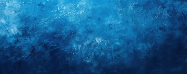A blue background with a splash of white. The blue is very dark and the white is very light
