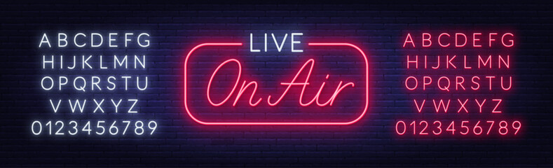 Live On Air Neon Sign on brick wall background. Red and white neon alphabet. © TanyaFox