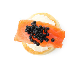 Delicious puff pastry with cream cheese, salmon and black caviar isolated on white, top view
