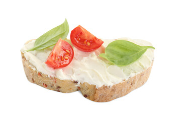 Piece of bread with cream cheese, basil leaves and tomato isolated on white