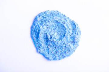 Berry yoghurt ice cream close-up on a white background. Smoothies from fresh fruits and berries. Ice cream texture. Delicious sweet dessert close-up as a background.