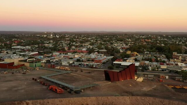 Lode miners memorial on top of hill over Broken Hill city and Junction mine as 4k.
