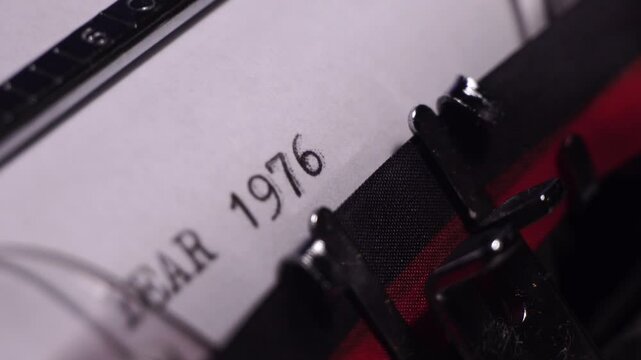 Year 1976, Typing on Blank White Paper in Vintage Typewriter, Close Up