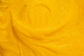 Fruit yogurt ice cream. Smoothies from fresh fruits and berries. Ice cream texture. Delicious sweet dessert close-up as a background.