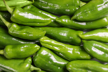 Sweet green bell pepper, close-up background on surface