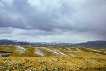 Gannan Tibetan Autonomous Prefecture, Gansu Province - grassland under the snow-capped mountains